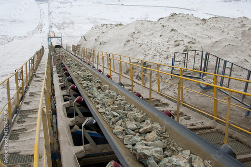 Mining of copper. Belt conveyor. Spreader photo