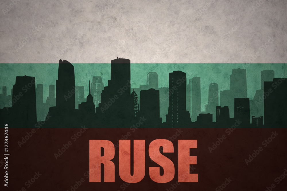 abstract silhouette of the city with text Ruse at the vintage bulgarian flag