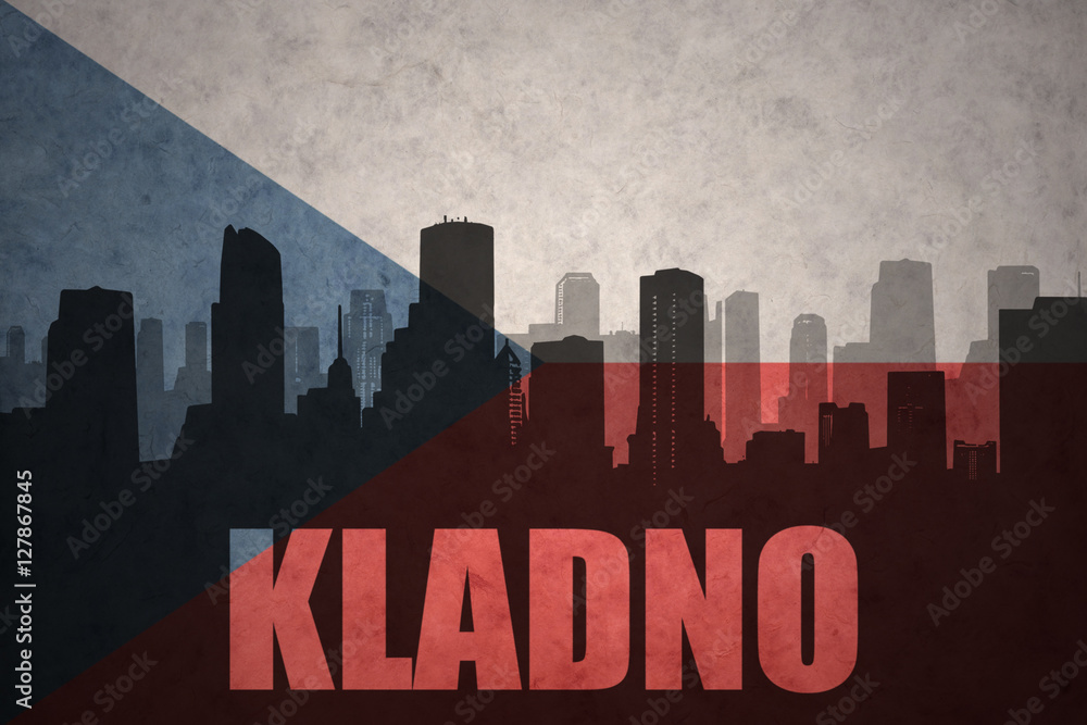 abstract silhouette of the city with text Kladno at the vintage czech republic flag