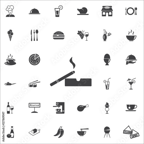 Cigarette in an ashtray icon. Vector illustration.