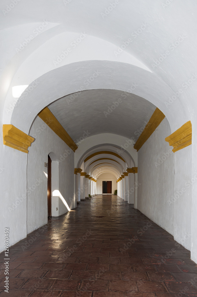 Large yellow and white Baroque style building in Antigua, guatemala