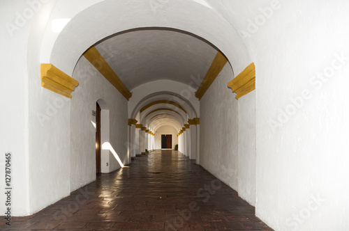 Large yellow and white Baroque style building in Antigua, guatemala