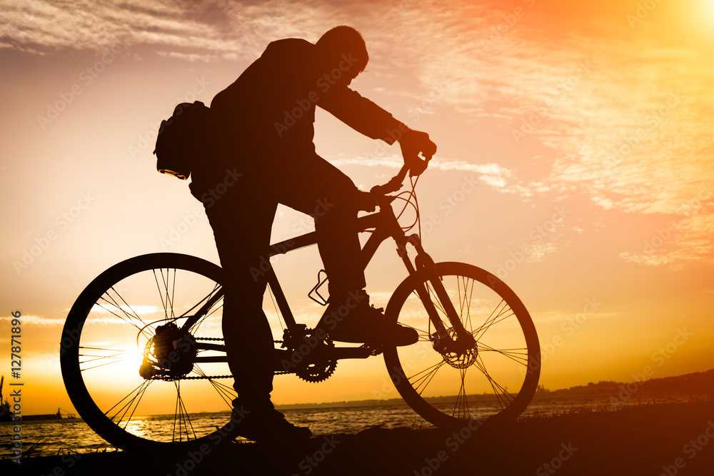 Fototapeta premium Silhouettes Of Biker