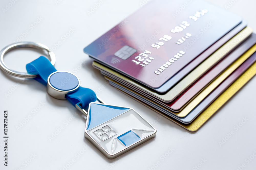 credit cards, key ring - concept mortgage on white background credit cards, key ring - concept mortgage on white background