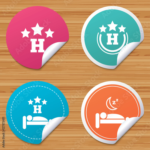 Round stickers or website banners. Three stars hotel icons. Travel rest place symbols. Human sleep in bed sign. Circle badges with bended corner. Vector