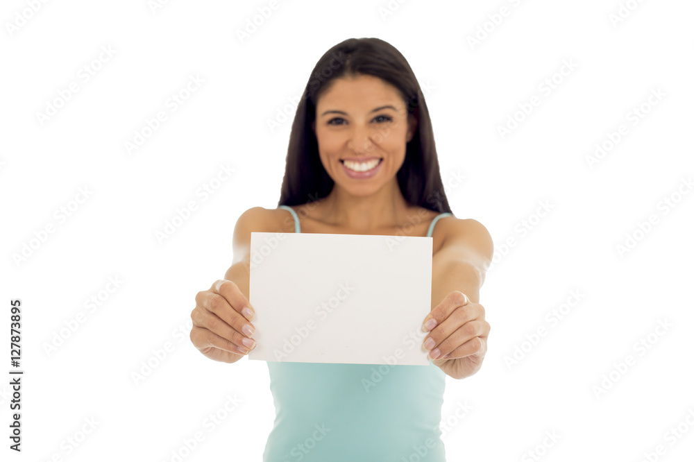 young attractive and happy hispanic woman holding blank card with copy space young attractive and happy hispanic woman holding blank card with copy space
