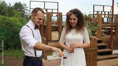 Wedding ceremony. Beautiful couple and the sand ceremony.