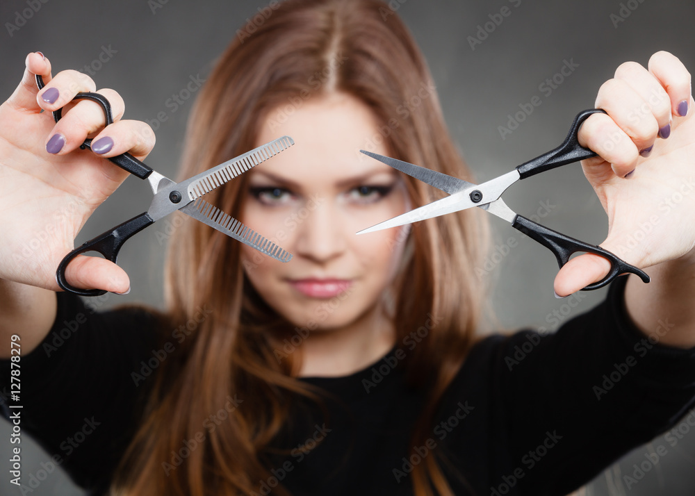Professional hairdresser with scissors ready to cut. Professional hairdresser with scissors ready to cut.
