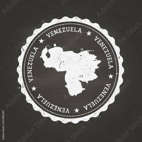 White chalk texture rubber stamp featuring the map of the Bolivarian Republic of Venezuela on a black schoolboard. Grunge seal with country outline, vector illustration.