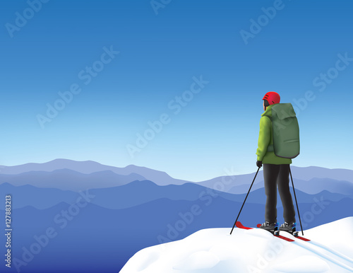 Lonely skier high in the snowy mountains