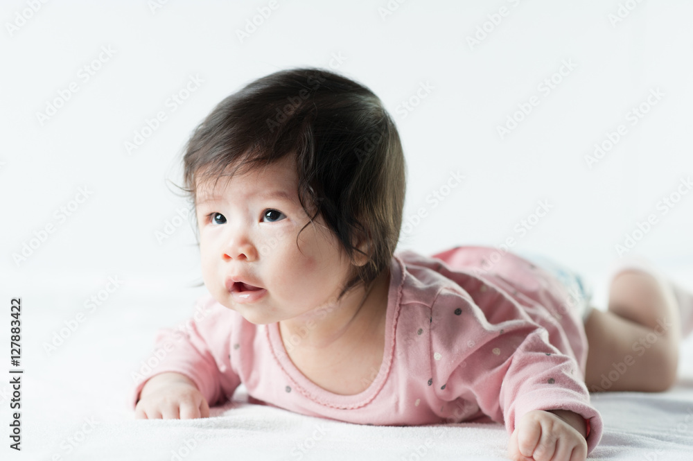 newborn baby girl in pink dress on white background newborn baby girl in pink dress on white background