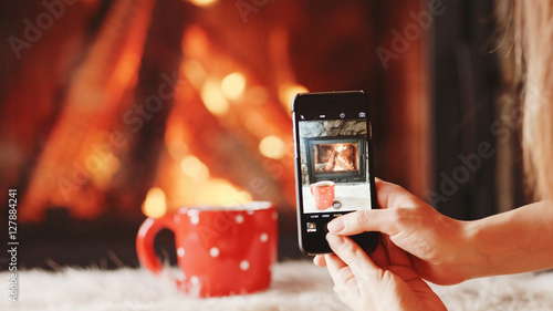 Unrecognizable Woman Hands Taking Cozy Picture on the SmartPhone