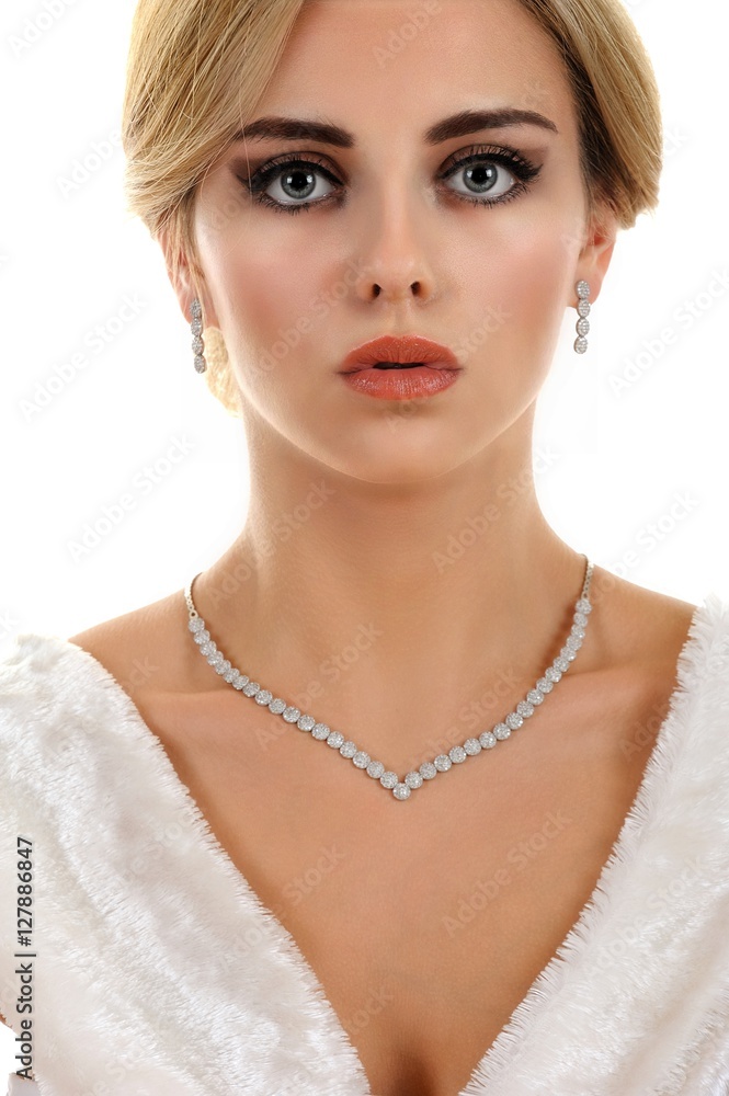 Beautiful belonde girl with luxury jewellery