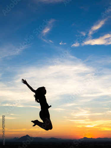 Wallpaper Mural Young woman enjoying outdoors, sky background,sunset Torontodigital.ca