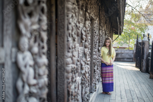 Beautiful girl in Myanmar traditional costume, identity culture