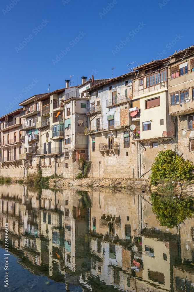 Reflection of old houses in the river of Valderrobres