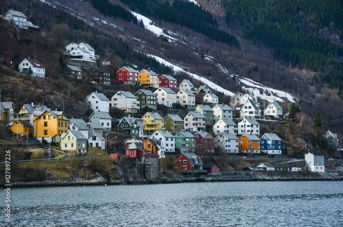 Village in Norway. Typical houses near by lake in the sharp hill. Original wallpaper of scandinavian life. © kovop58