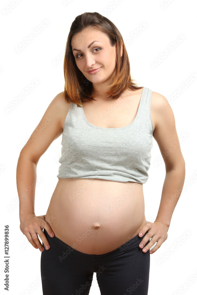 Young happy pregnant woman, isolated on white background Young happy pregnant woman, isolated on white background