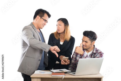 Portrait of business partners discussing documents and ideas at © Johnstocker