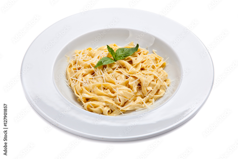 Plate of a italian pasta with grated parmesan cheese and basil l