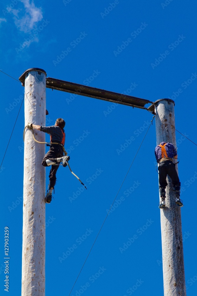 Lumberjack pole climbing on Grouse Mountain in Canada Lumberjack pole climbing on Grouse Mountain in Canada