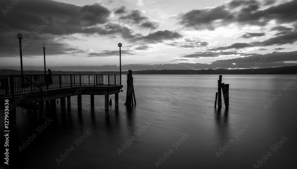 Sunset on Bracciano lake in Italy, long exposure in black and wh