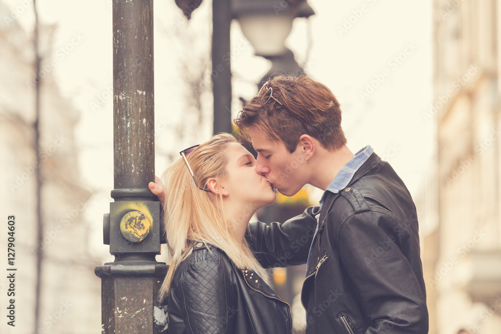 Couple enjoying outdoors in a urban surroundings. Couple enjoying outdoors in a urban surroundings.