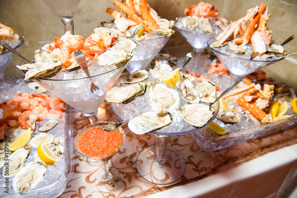 Mussels and other marine products served in large cocktail dishe Mussels and other marine products served in large cocktail dishe