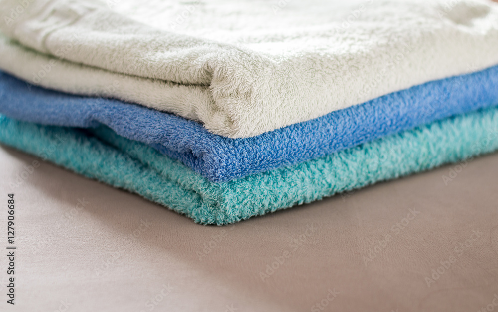 a stack of towels
a stack of towels