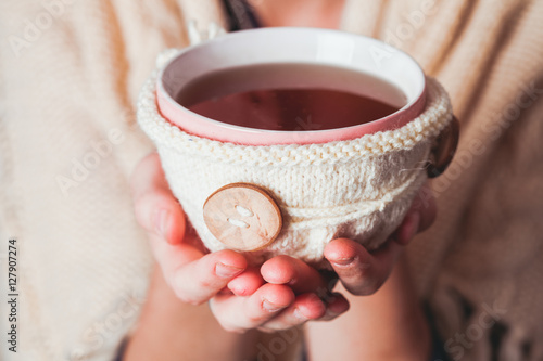 Woman with cup of tea