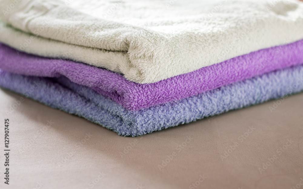 a stack of towels
a stack of towels