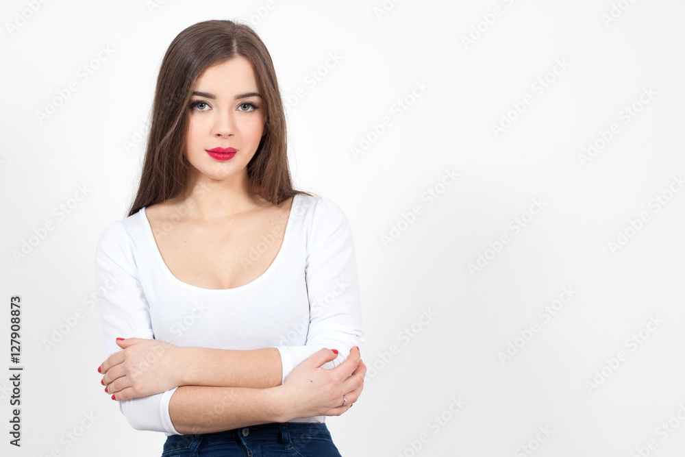 Beautiful Young Woman with Fresh Clean Skin touch own face. Red lips, red lipstick. Cosmetology, beauty and spa. Beautiful Young Woman with Fresh Clean Skin touch own face. Red lips, red lipstick. Cosmetology, beauty and spa.