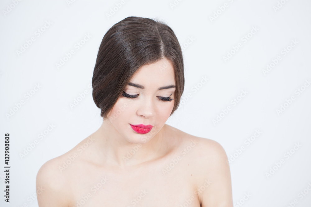 Beautiful Young Woman with Fresh Clean Skin touch own face. Red lips, red lipstick. Cosmetology, beauty and spa. Beautiful Young Woman with Fresh Clean Skin touch own face. Red lips, red lipstick. Cosmetology, beauty and spa.