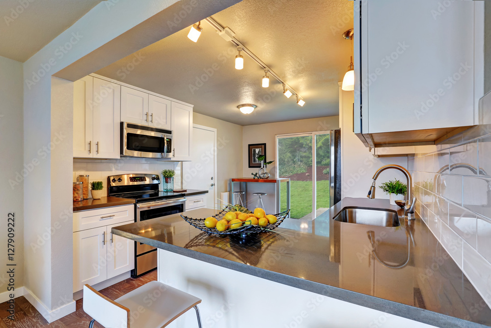 Freshly remodeled kitchen room with white cabinetry Freshly remodeled kitchen room with white cabinetry