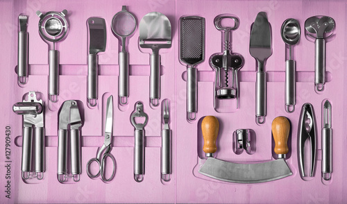 a set of kitchen utensils in a wooden box