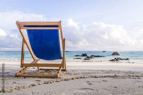 Fototapeta Naklejka Na Ścianę i Meble -  Deck chair at white beach in Ko Lipe, Thailand