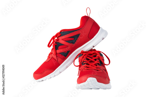 Red sport running shoes isolated on white background