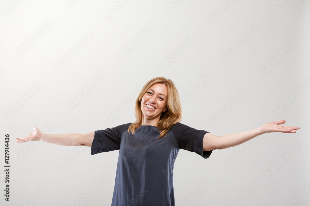 blonde real smiling woman with open arms blonde real smiling woman with open arms