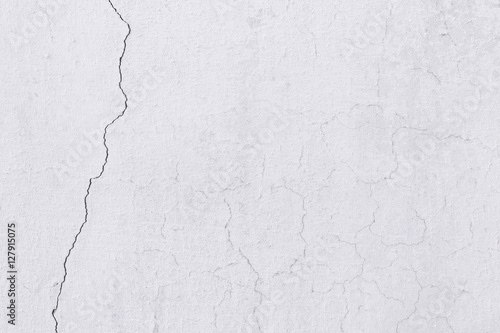 white concrete wall with crack. Background