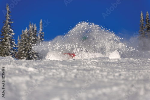 Snowboarder doing a toe side carve © aleksey ipatov