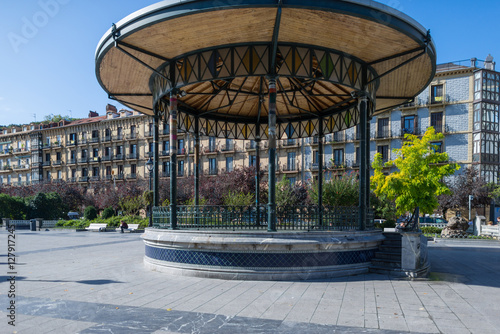 Bandstand at the public square Plaza Easo. The picturesque pavilion, Spanish, Kiosko de la Plaza de Easo, is in inner city and close to the Amara train station in Donostia San Sebastian photo