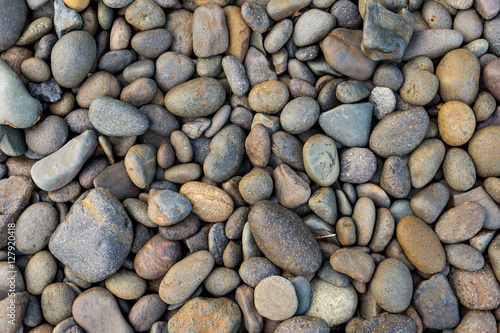 Rocky beach background, stones pattern background
