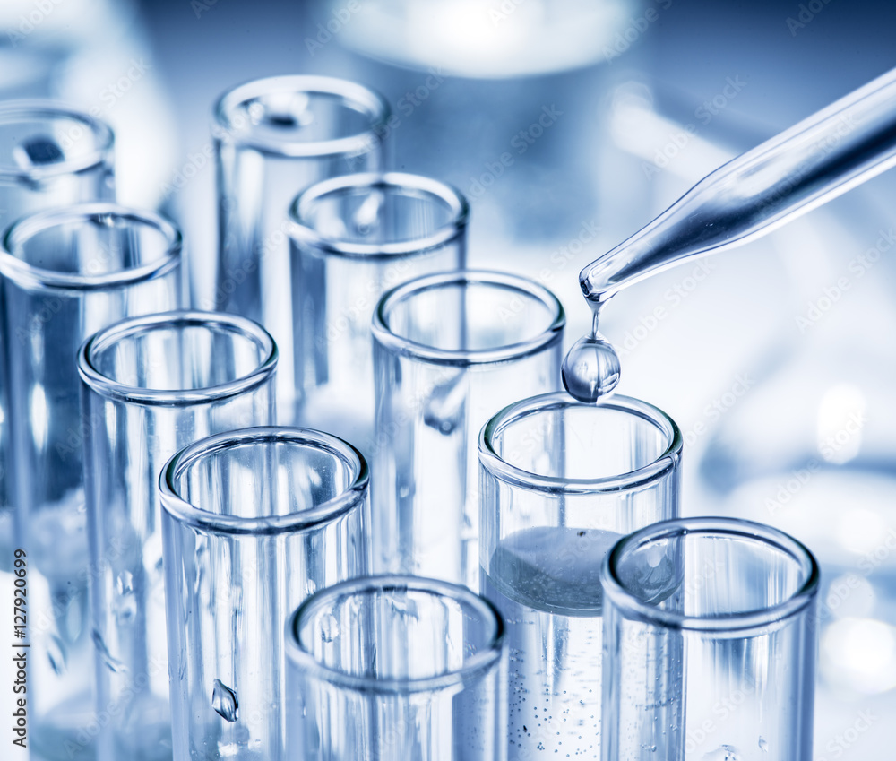 Different laboratory beakers and glassware. Stock Photo | Adobe Stock