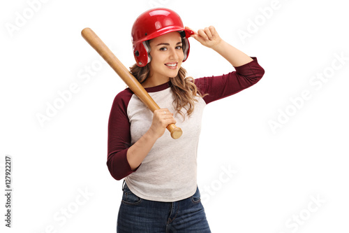 Photography Young woman wearing a helmet and holding a baseball bat