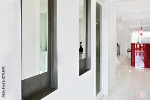 Interior of a modern house with hallway and close view of a wind