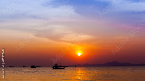 Beautiful landscape. sunset on the beach with fishing boat © EwaStudio