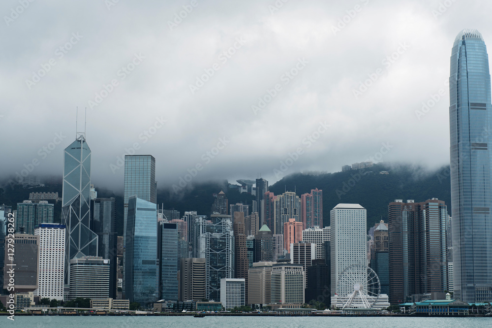 Hong Kong skyline in the rainy season with smog cloud Hong Kong skyline in the rainy season with smog cloud