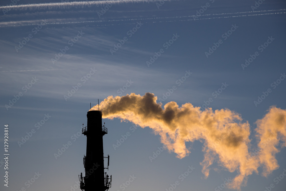 Factory chimney with a smoke