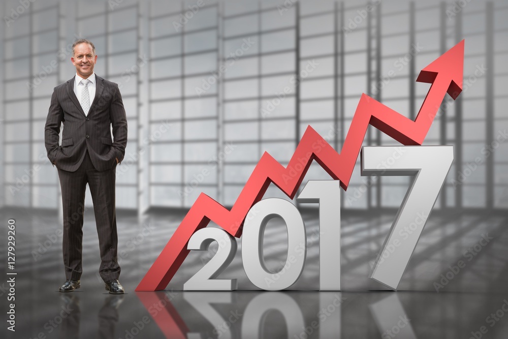 Composite image of warehouse manager standing with hands in the Composite image of warehouse manager standing with hands in the