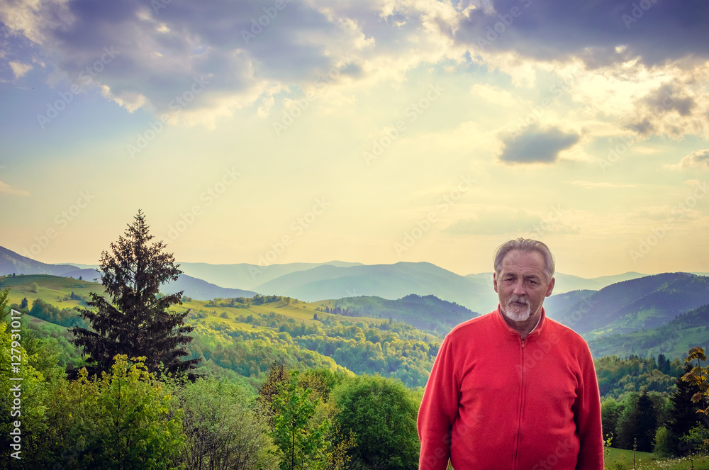 Senior man and beautiful landscape